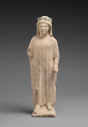 Limestone statuette of a boy
