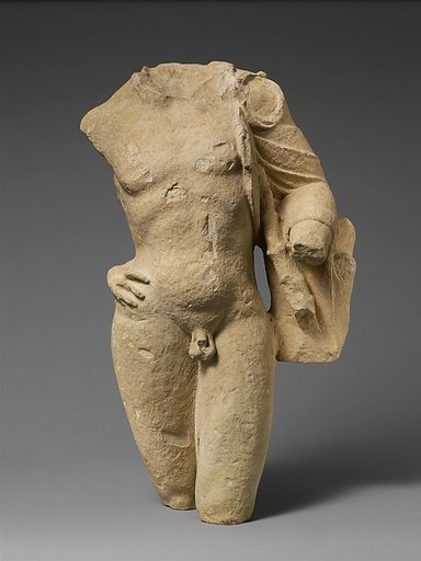 Fragment of a limestone statuette of Pan