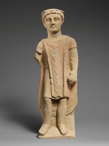 Limestone statuette of a boy holding a pyxis