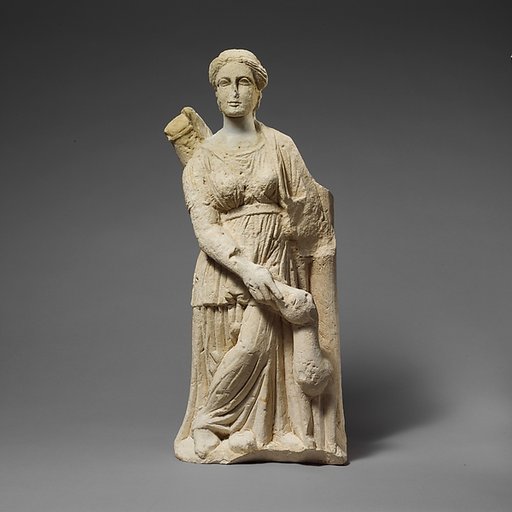 Limestone statuette of Artemis with a fawn