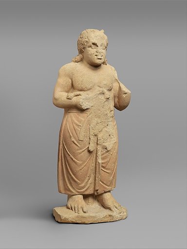Limestone statue of a god