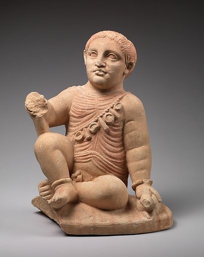 Limestone statuette of a temple boy