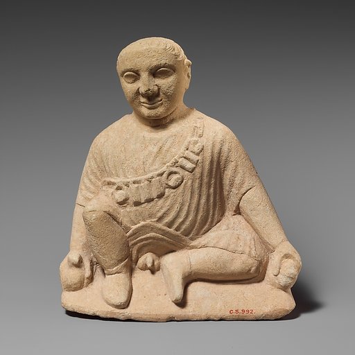 Limestone statuette of a temple boy