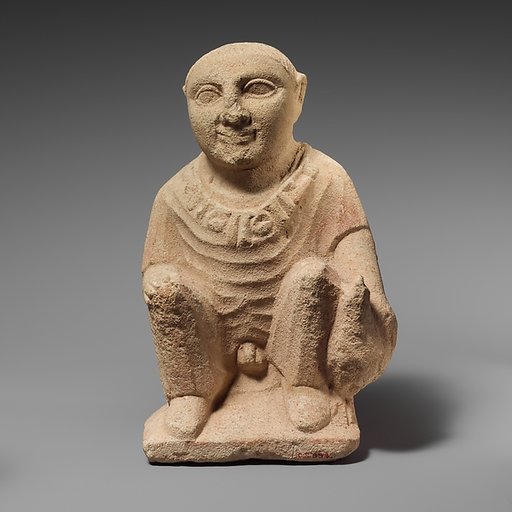 Limestone statuette of a temple boy