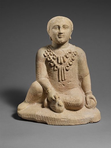 Limestone temple boy