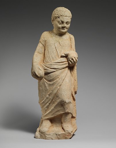Limestone statuette of a boy holding a duck