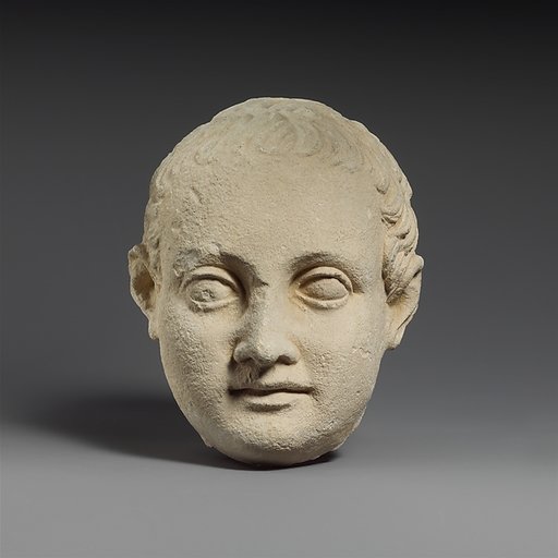 Limestone head of a boy