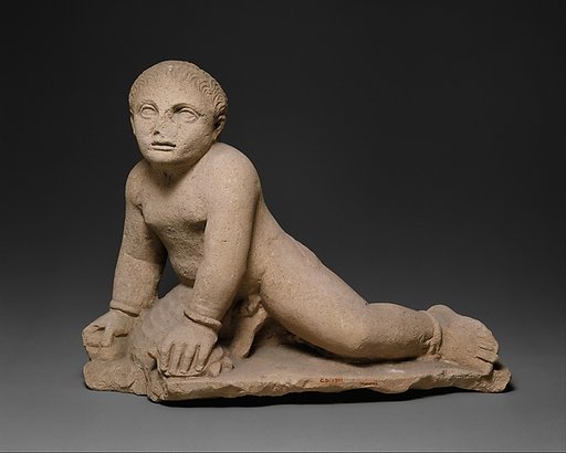 Limestone temple boy