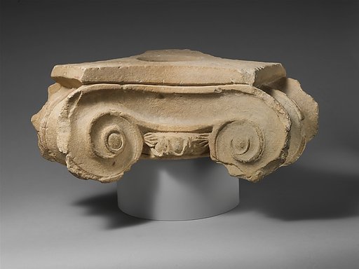 Limestone votive Ionic capital