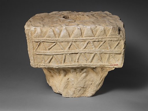 Limestone votive square capital