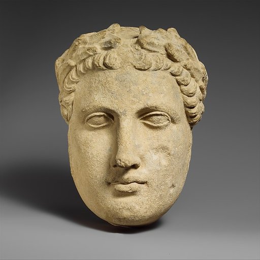 Limestone head of beardless male votary