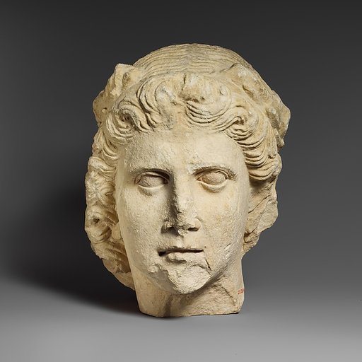 Limestone head of Apollo