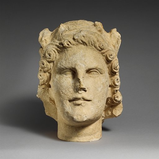 Limestone head of Apollo
