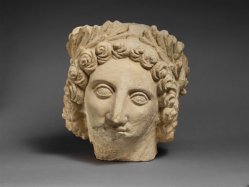 Limestone head of Apollo