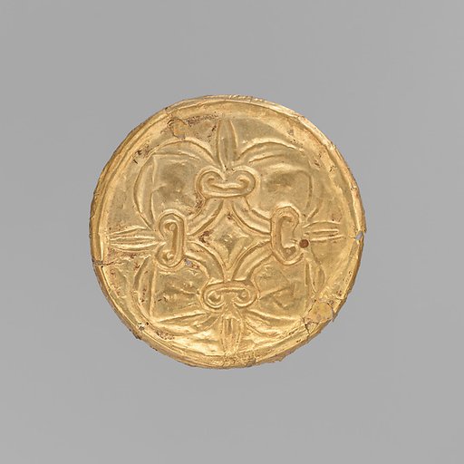 Gold roundel with stamped designs