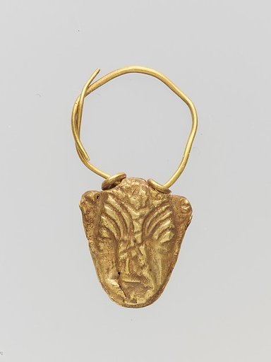 Gold pendant in the form of a bull's head