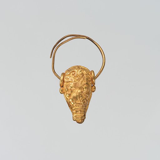 Gold earring with head of a bull