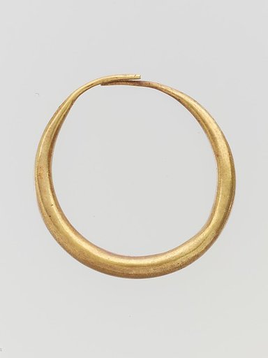 Gold annular earring