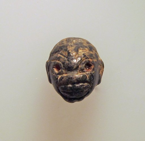 Chlorite pendant in the shape of a Black  African's head