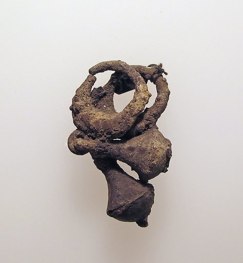 Two silver earrings with nail head pendants, corroded together