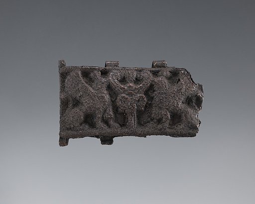 Silver bead, plaque from a necklace