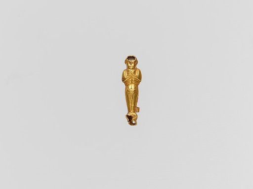 Gold pendant capsule in the form of a male figure