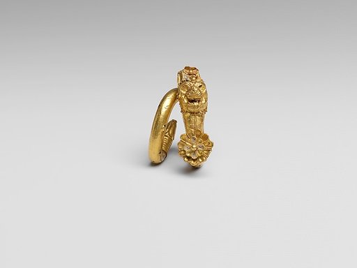Gilt bronze spiral with lion-griffin terminal