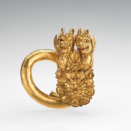 Gold spiral with double lion-griffin-head terminal