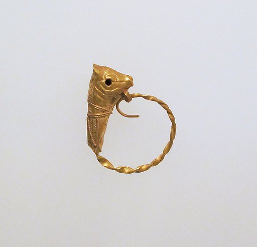 Gold earring with head of a bull
