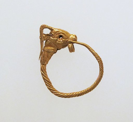Gold earring with head of a goat
