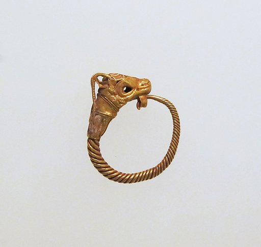 Gold earring with head of a goat