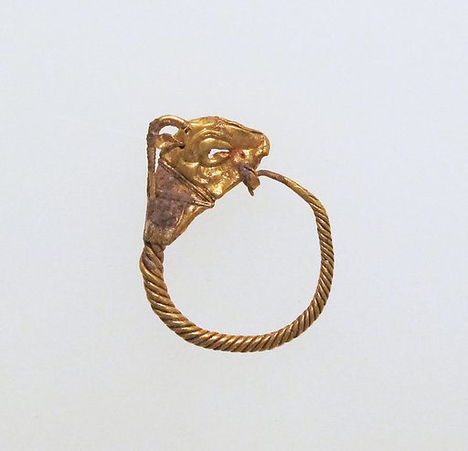 Gold earring with head of a goat