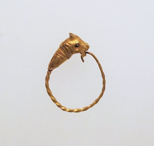 Gold earring with head of a bull
