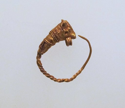 Gold earring with head of a bull