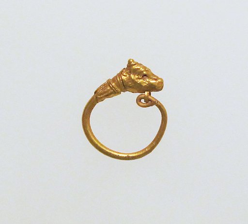 Gold earring with head of a bull