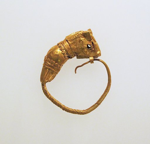Gold earring with head of a bull