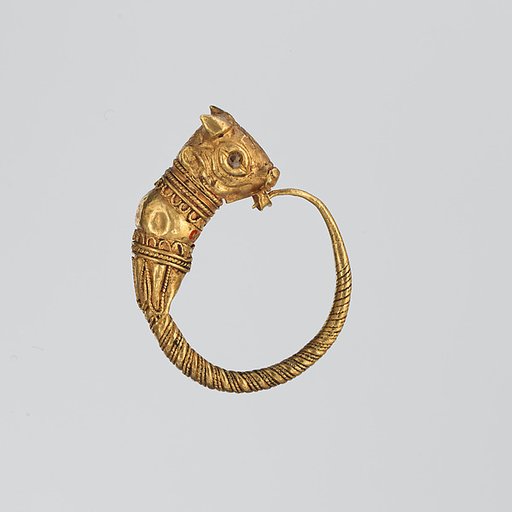 Gold earring with head of a bull