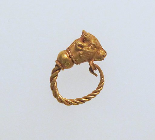 Gold earring with head of a bull