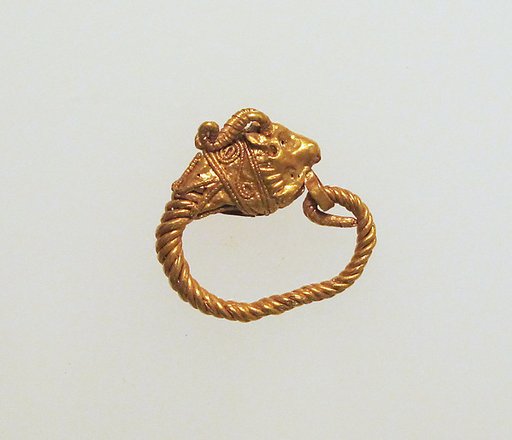 Gold earring with head of a goat