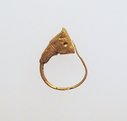 Gold earring with head of a bull