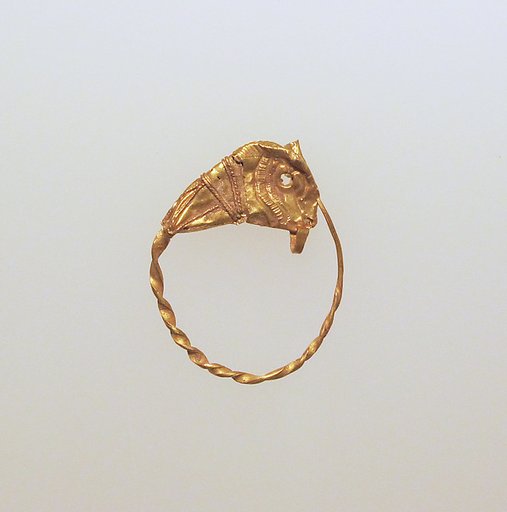 Gold earring with head of a bull