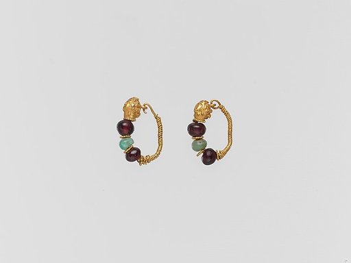 Gold earring with woman's head and beryl and garnet beads
