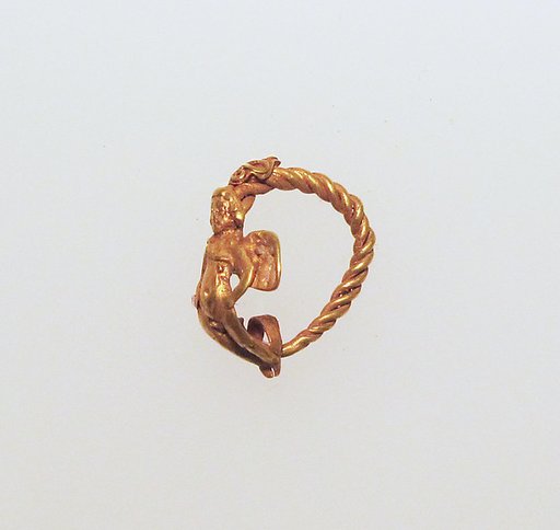 Gold earring with winged Eros