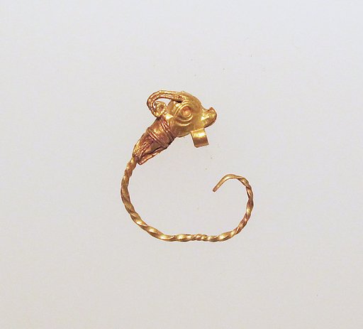 Gold earring with head of a goat