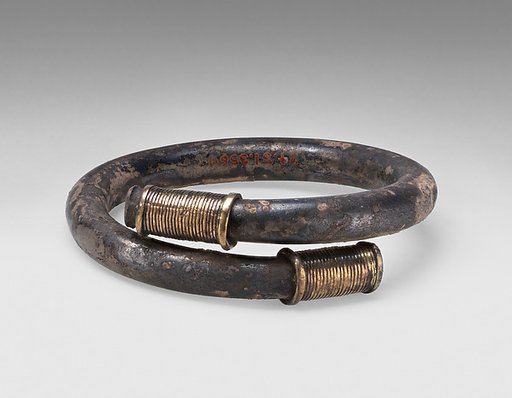 Silver bracelet with gold terminals