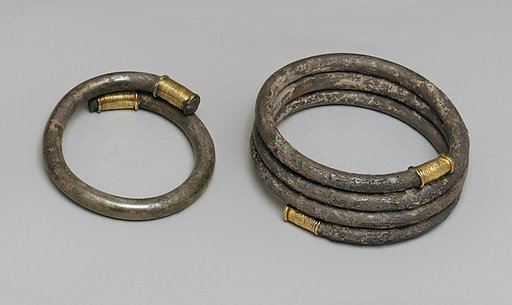 Silver bracelet with gold terminals