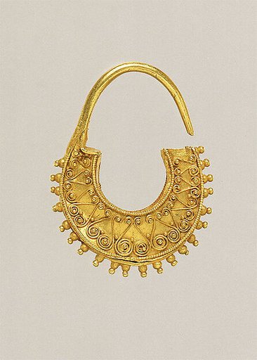 Gold crescent-shaped earring