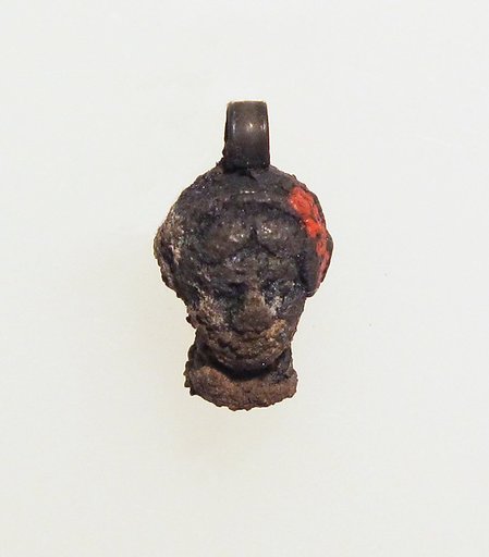 Silver pendant in the form of a woman's head