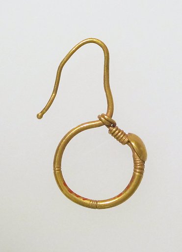 Earring, delta-shaped