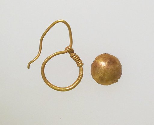 Earring, delta-shaped